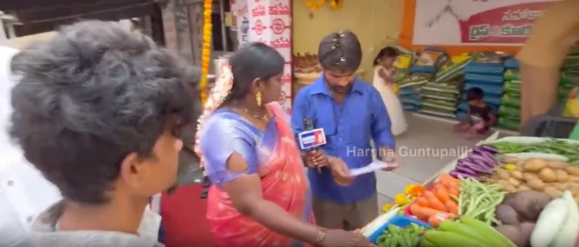 Kuridi villagers receiving mangoes from Pawan Kalyan's farm