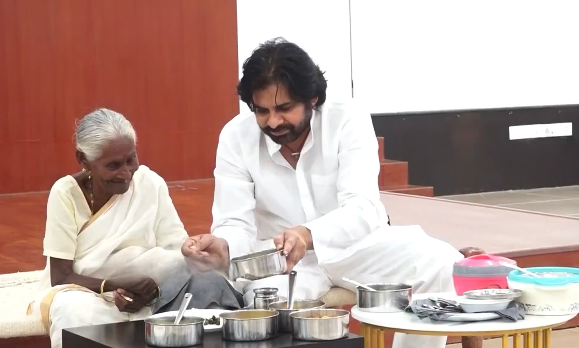Pawan Kalyan meeting the elderly woman who blessed him