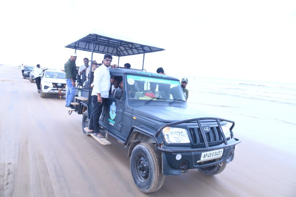 Forest department jeep carrying the AP Green inspection team along Suryalanka beach