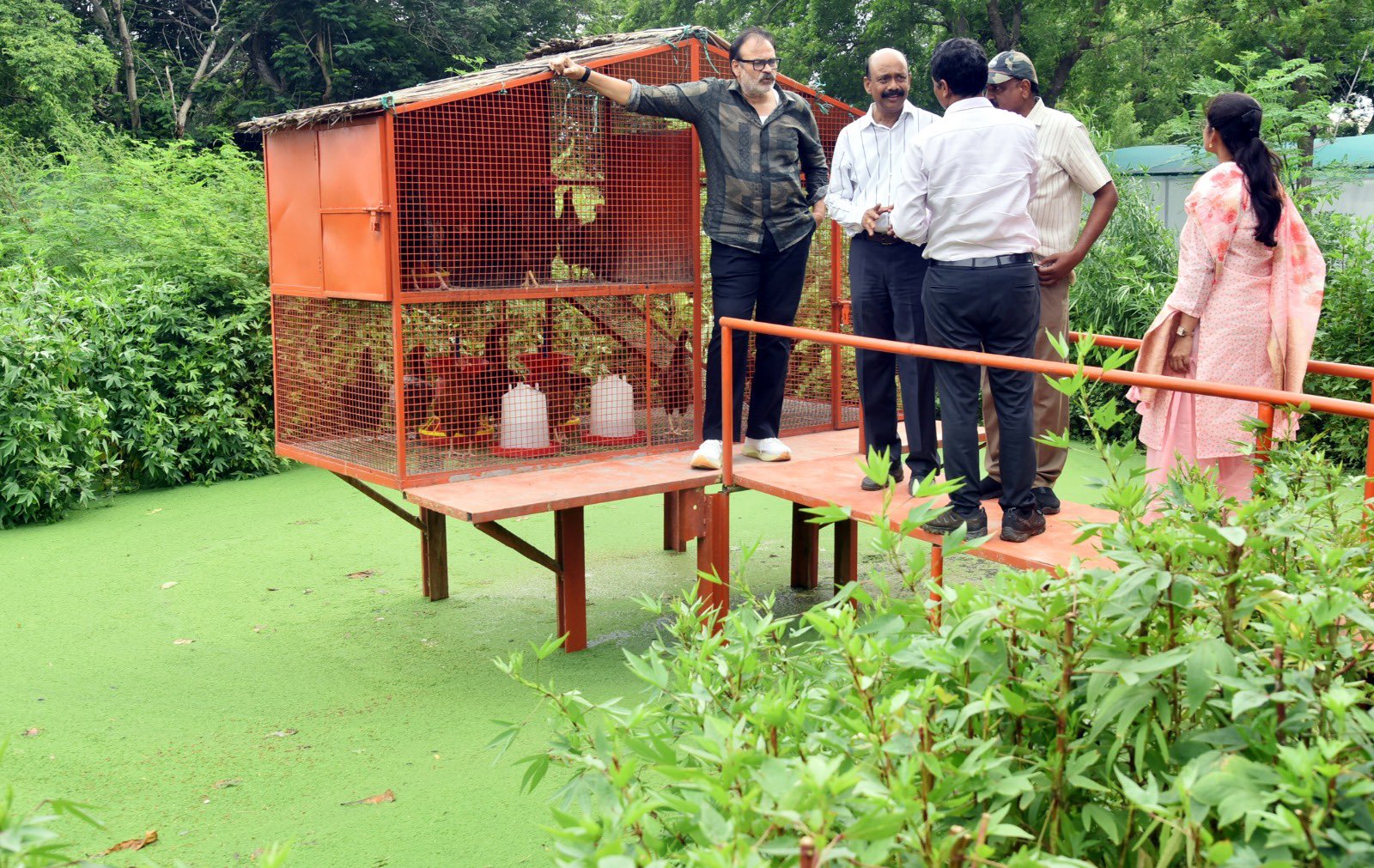 Naga Babu planting a sapling at the Swachhta Hi Seva 2026 programme at Krishi Vigyan Kendra, Lam, Guntur