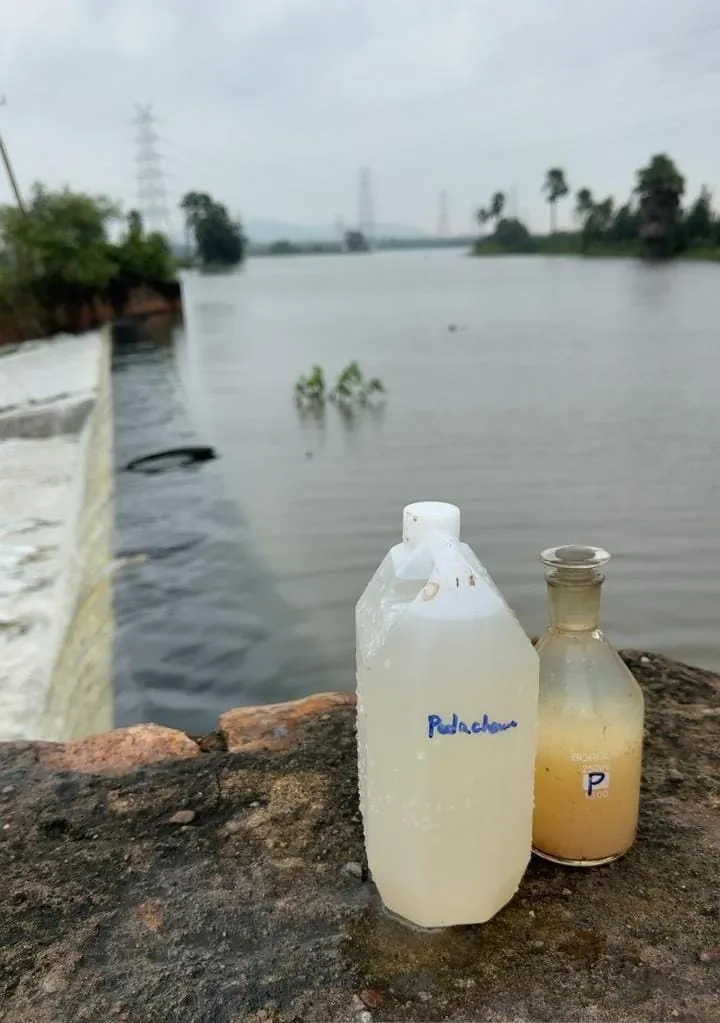 Water samples collected in bottles beside a water body near Parawada Pharma City