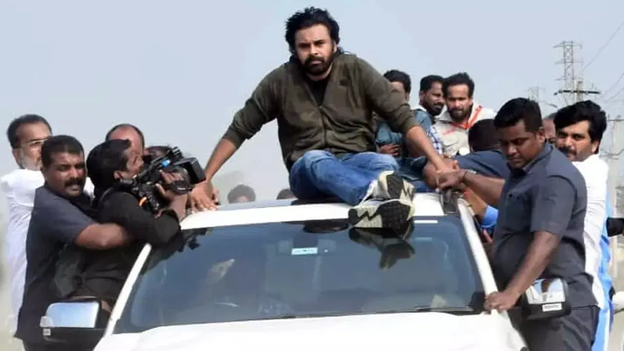 Jana Sena leader Pawan Kalyan conducting a rooftop rally during his visit to Ippatam village despite police restrictions